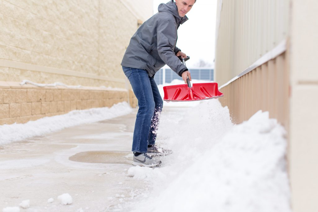 man shoveling snow