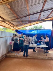 Kinetic Edge team members in Tanzania organizing medications